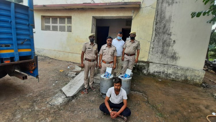 दुग्ध के भरे केनो की आड़ में हो रही अवैध शराब तस्करी रतनपुर चौकी पुलिस ने एक आरोपी किया गिरफ्तार